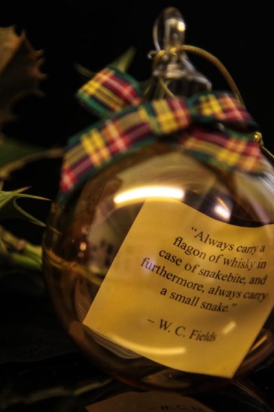 bottle of whisky with W C Fields quote